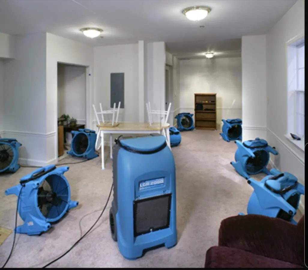 Air movers and dehumidifier setup for Water Damage Restoration in McHenry